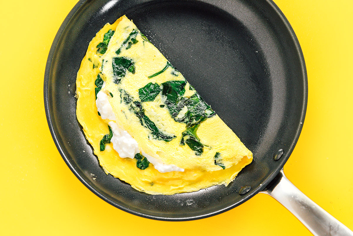 An omelette with cottage cheese folded in half