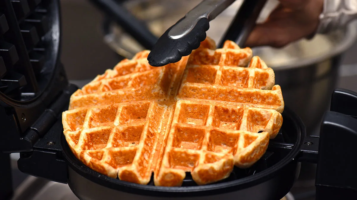 Waffle in an iron.