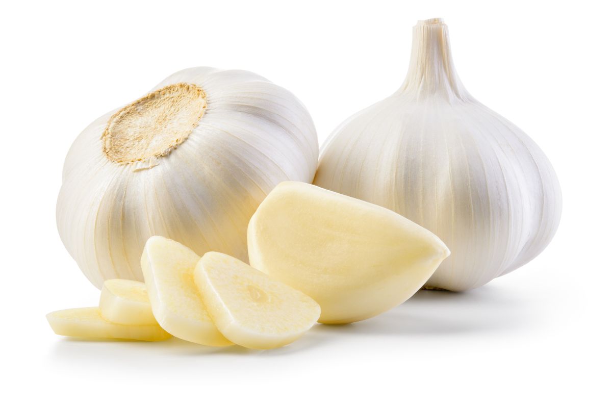 Garlic cloves on an isolated white background.